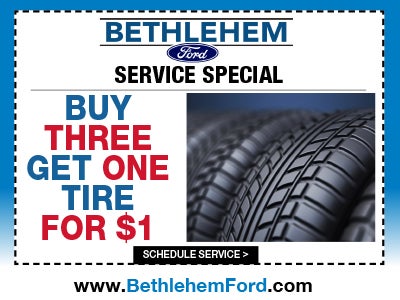 Buy three get one tire for $1